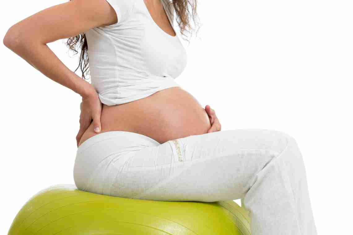 Чому болить низ живота при вагітності?