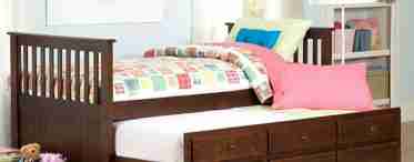Дитячі ліжка різних кольорів